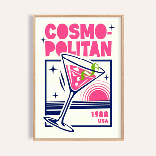 Framed Cosmopolitan Cocktail Art Print with bold pink and navy design in a wooden frame
