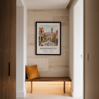 Marrakech Landscape wall art watercolour street scene with archways and fountain above a bench with a yellow cushion