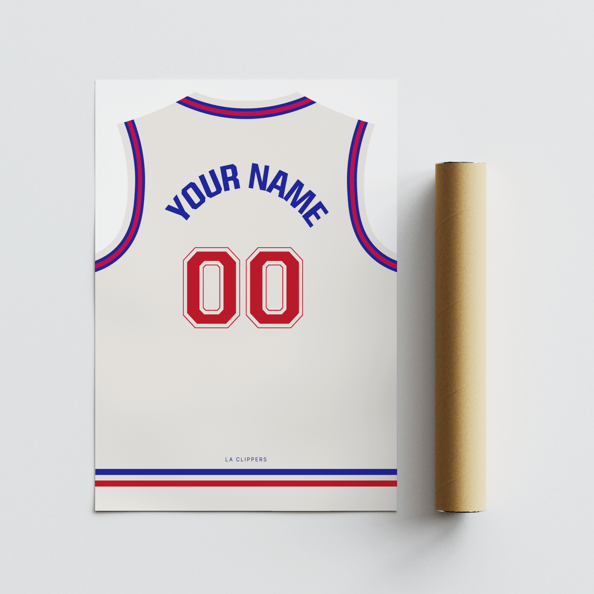 Custom basketball jersey print in plain white with red number lying flat with packaging tube