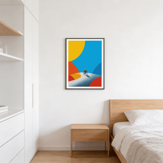 Cycling Art Print of a cyclist on a winding road in blue, yellow, red and orange in a bedroom above a bedside table