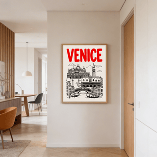 Venice Landmark Art Print in black and red line art hanging in a pale hallway next to a wooden door