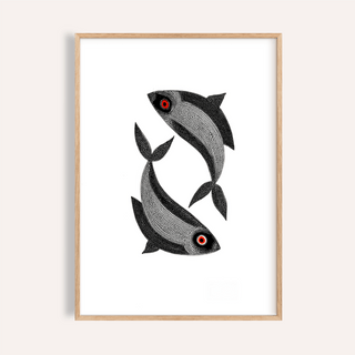 Framed Madhubani Fish wall art of two black fish with red eyes and white detailing