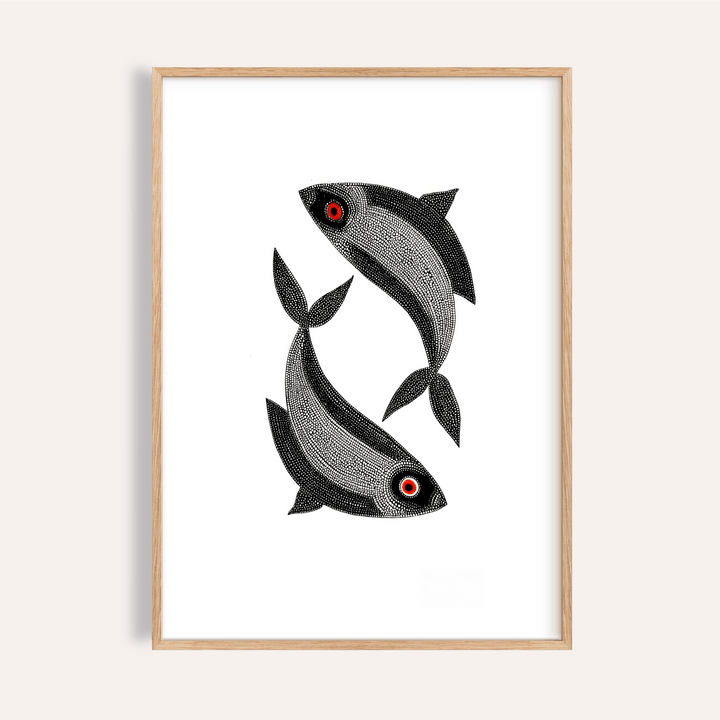 Framed Madhubani Fish wall art of two black fish with red eyes and white detailing