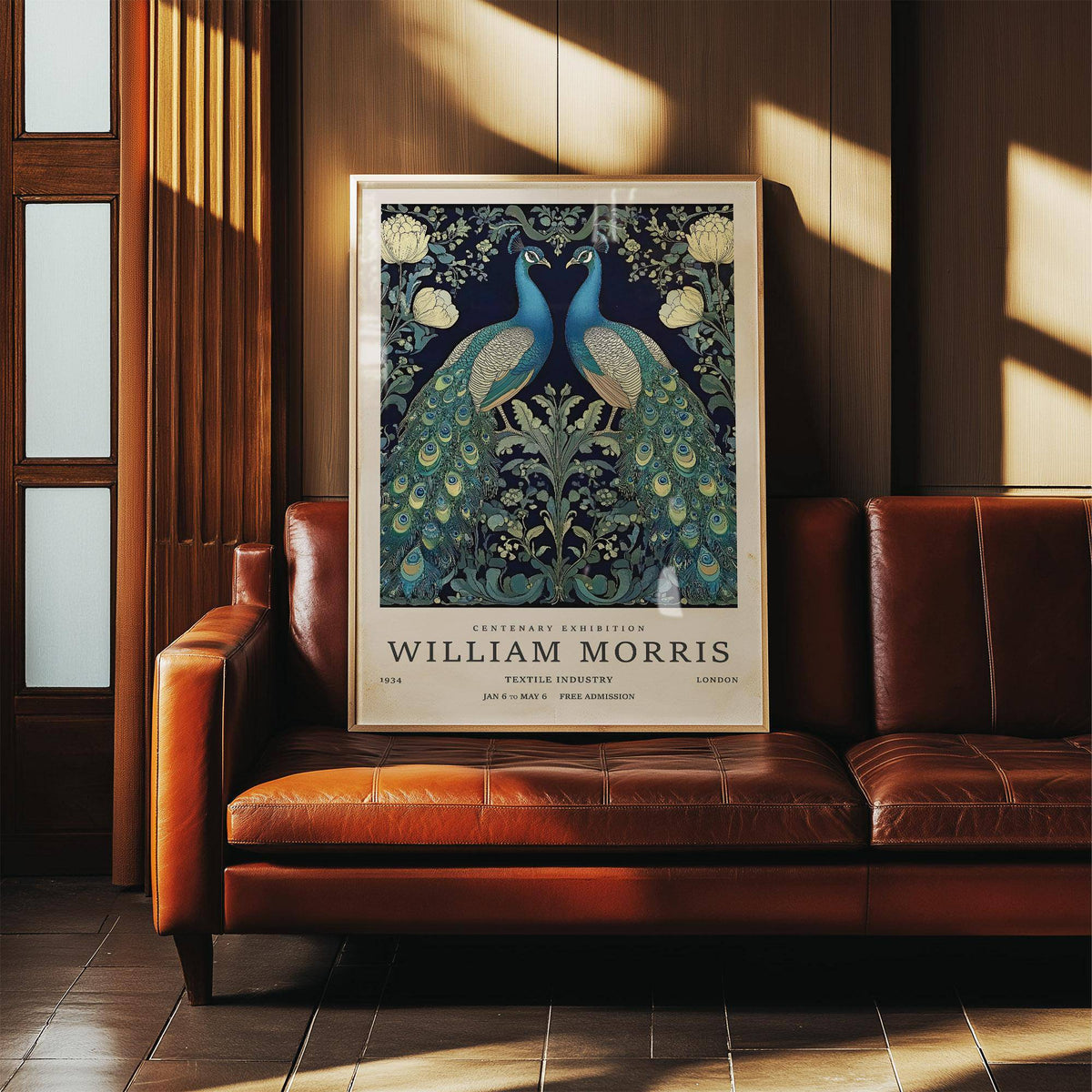 Large Peacock wall art with blue green peacocks leaning on a leather sofa in a wood panelled room