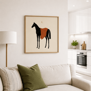 Horse Moon wall art of a black horse with an orange blanket above a sofa with cushions