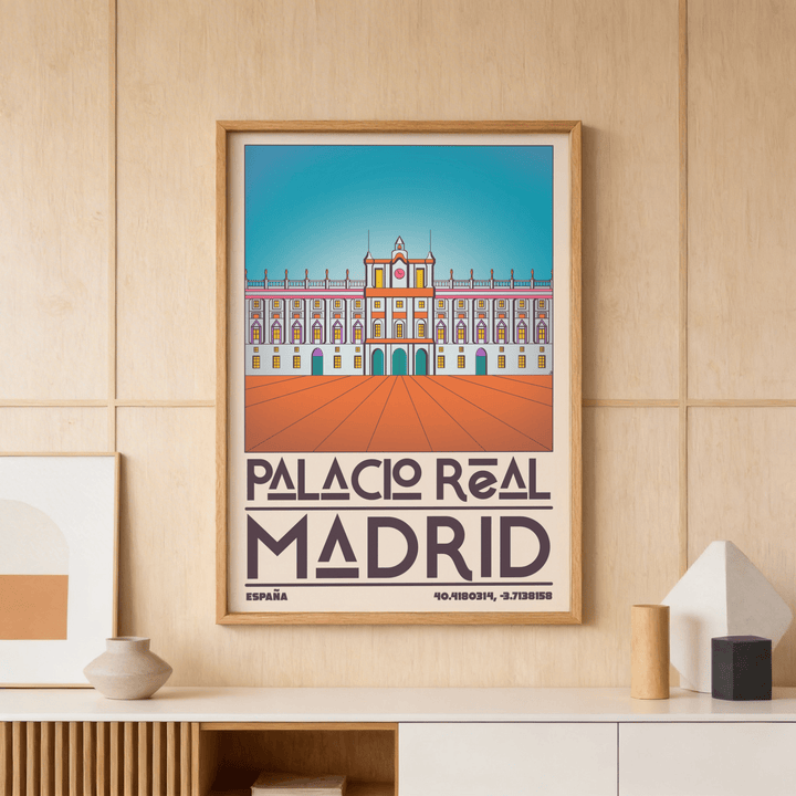Madrid Royal Palace Poster on a wooden wall above a cabinet with decorative objects