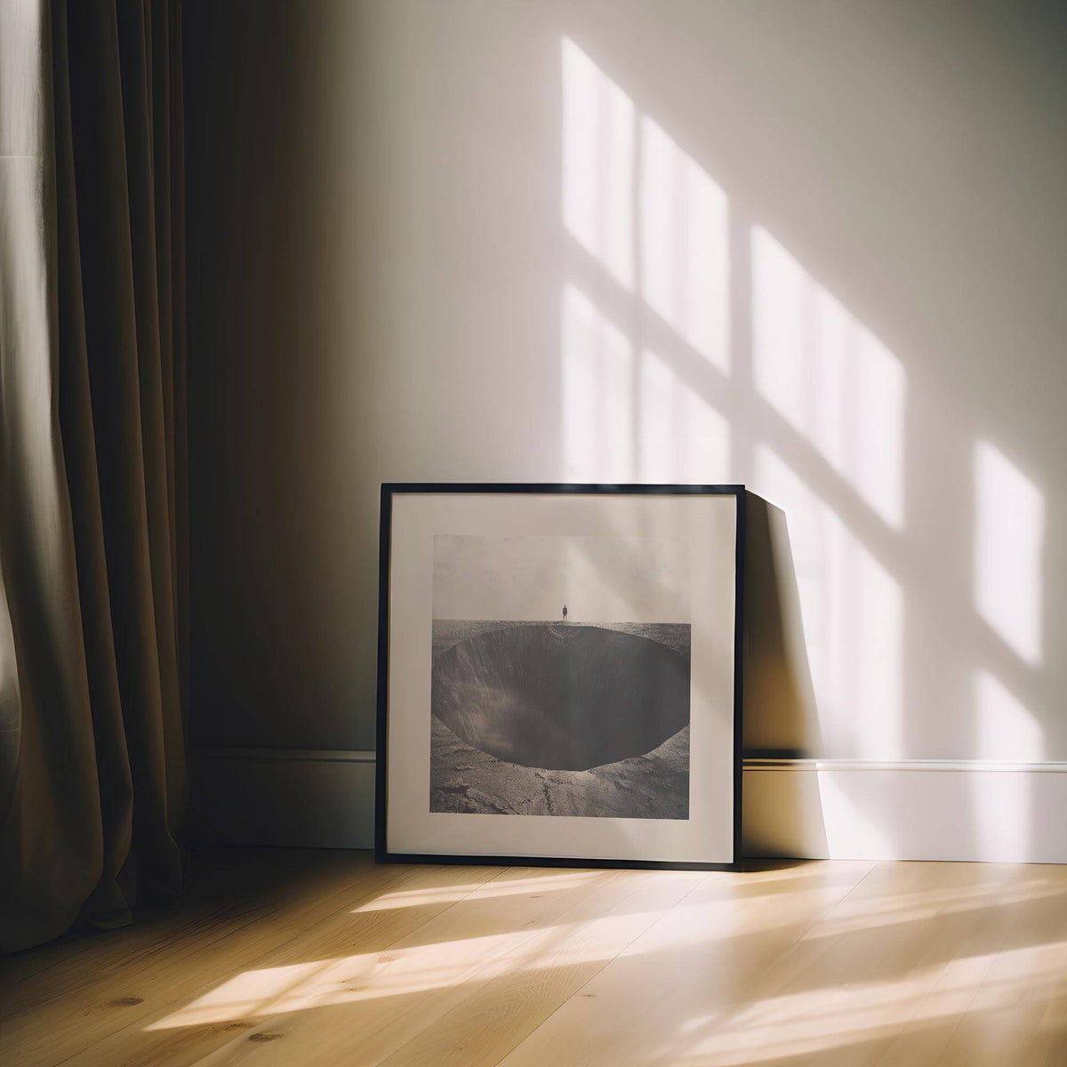 Framed surrealist wall art of an abyss hole leaning on the floor with sunny window shadows
