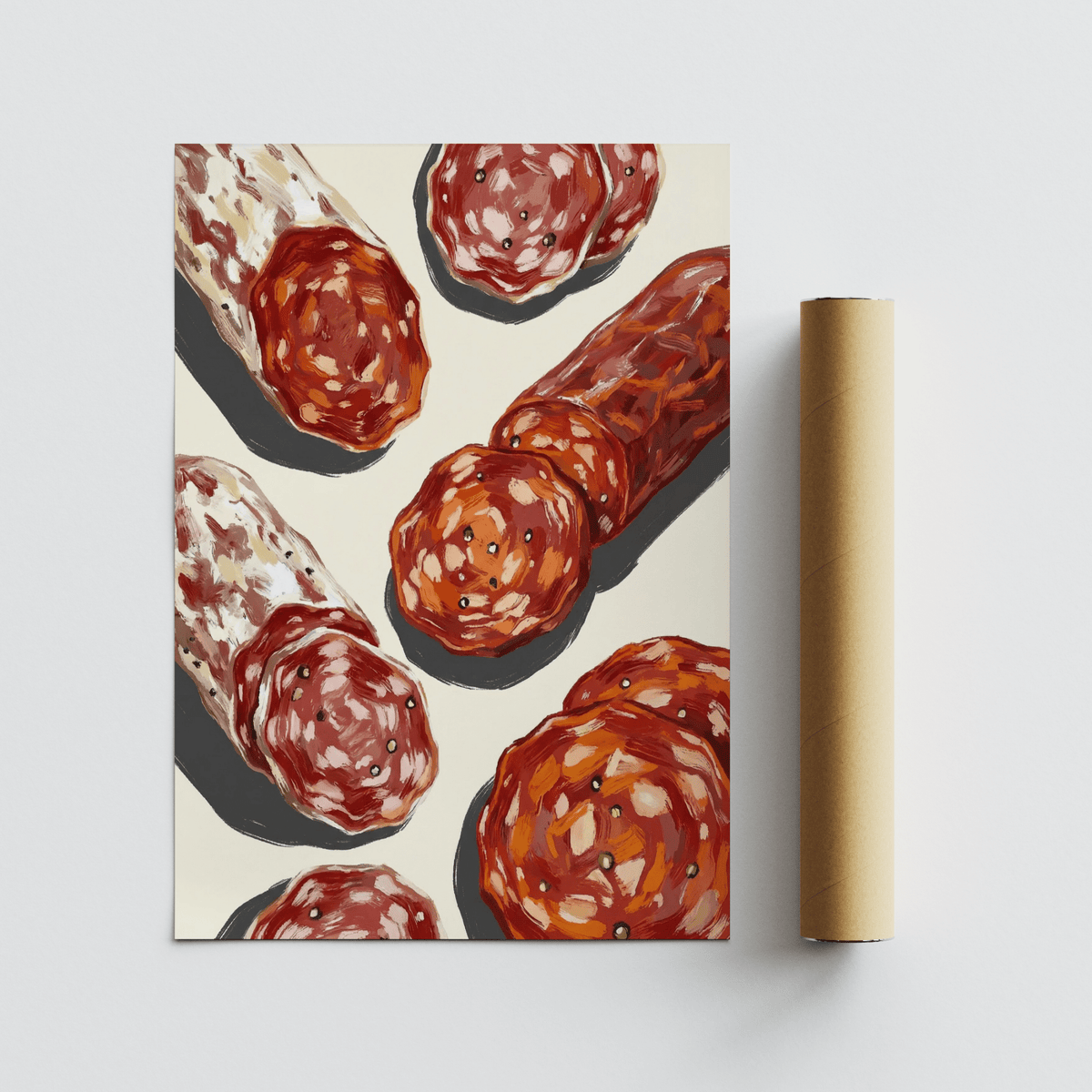 Italian Salami Print rolled alongside a packaging tube on a pale surface