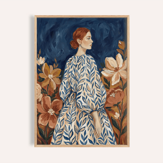 Framed modern gallery wall set print of a woman in a blue and white leafy dress with large flowers