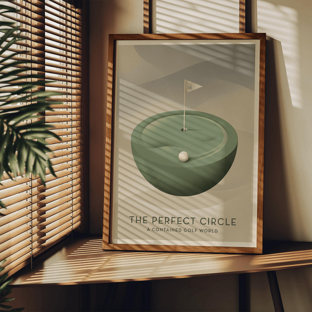 Print leaning on a shelf of a minimalist miniature golf hole with soft green and beige tones with plant nearby