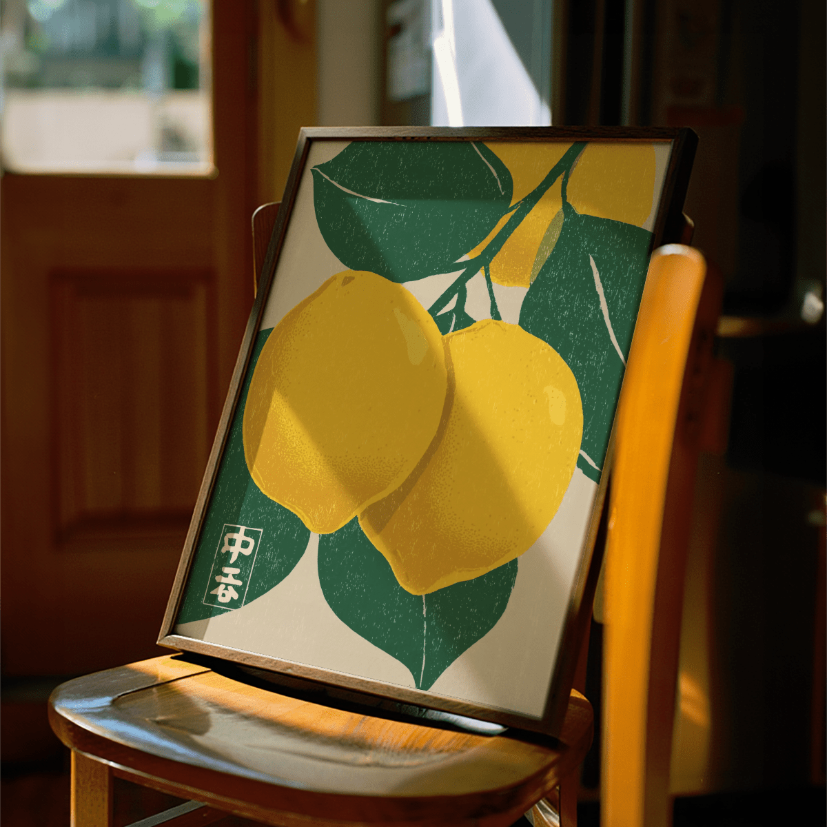Framed Large Citrus Fruit Art Print of yellow lemons and green leaves on a wooden chair