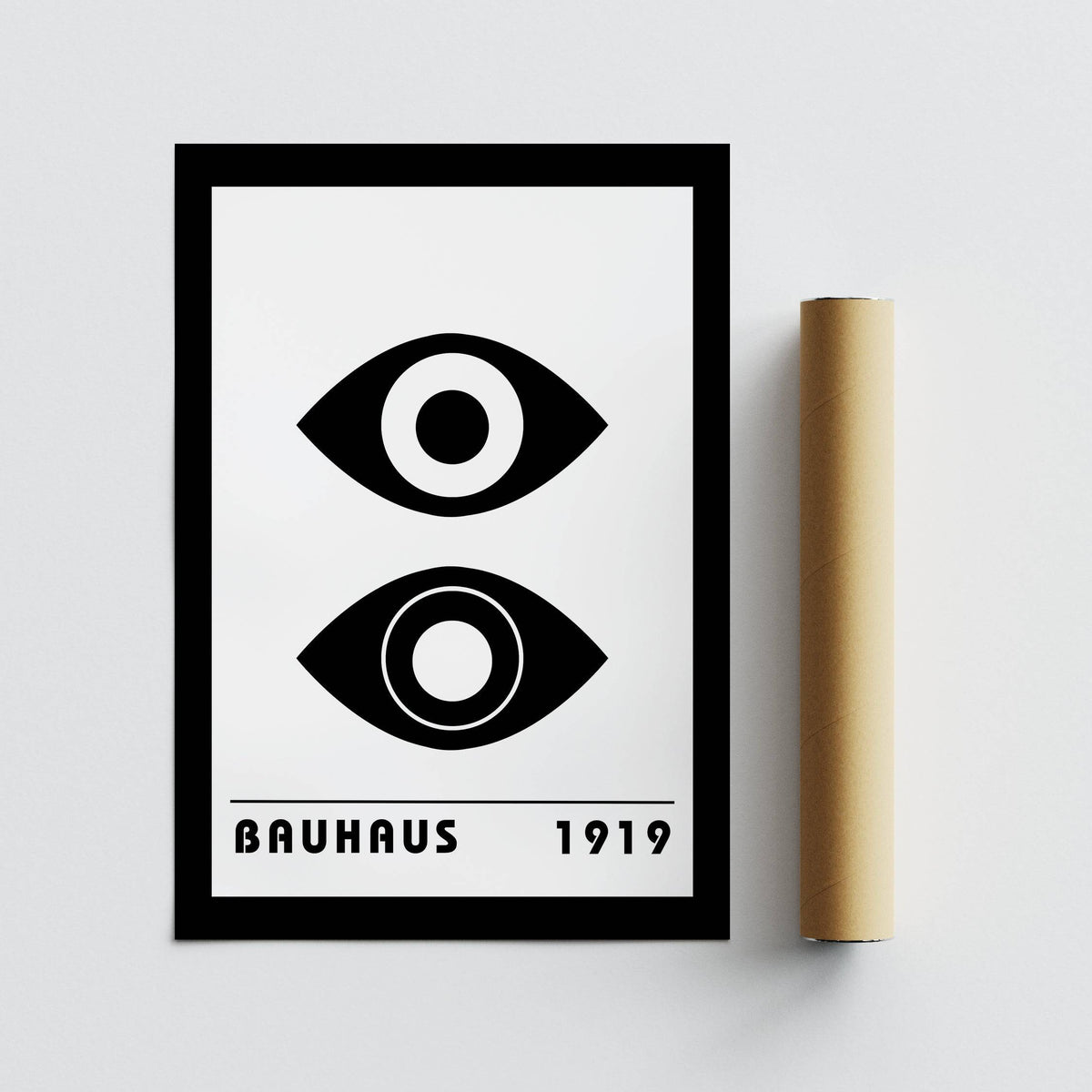 Bauhaus art print with stylised eyes in black and white with packaging tube