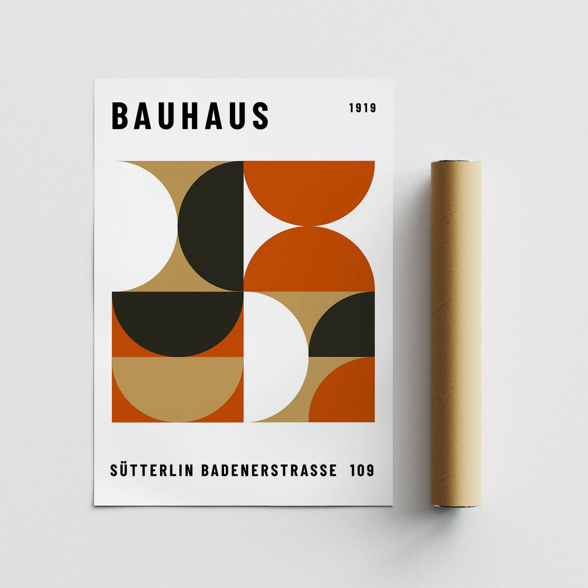 Office wall decor with geometric bauhaus shapes in black brown and orange with a packaging tube
