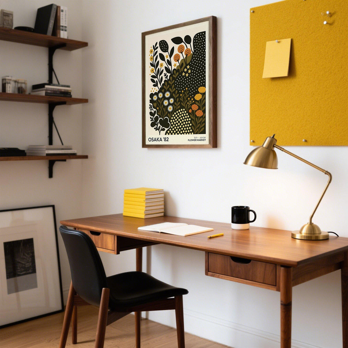 Daisy art print in minimalist style with golden daisy flowers above a wooden desk in a home office