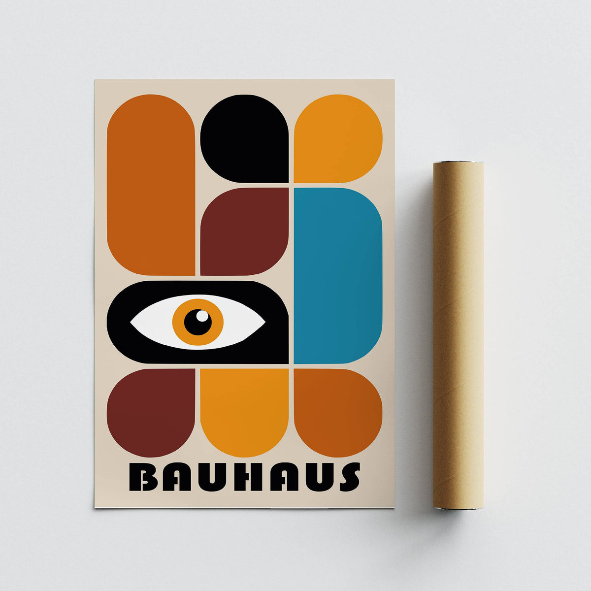 Modern Bauhaus Eye print with orange, black and blue geometric shapes next to a packaging tube