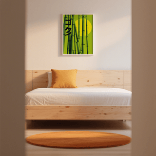 Green bamboo print on a white wall above a wooden bed with an orange pillow and matching circular rug
