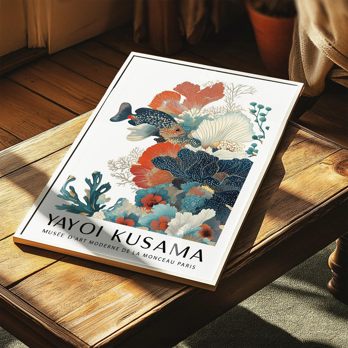 Tropical Fish Poster laid on a wooden table with sunlight showing reef fish and coral details
