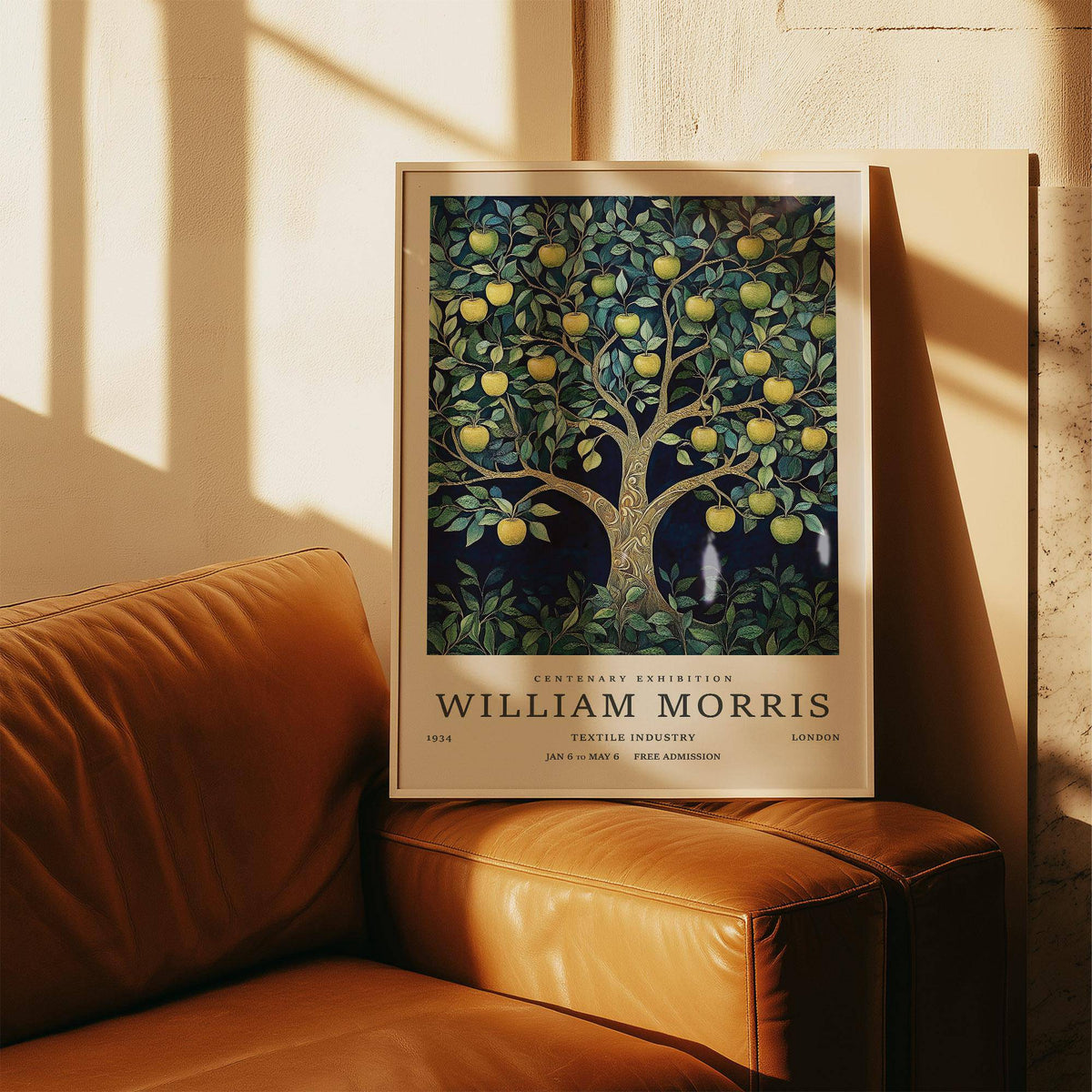 Tree Art Print leaning on a leather armchair with golden apples and dark green foliage