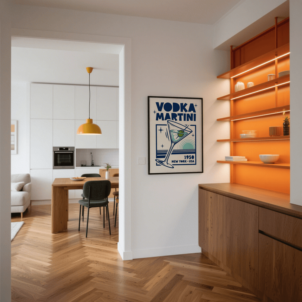 Print on a wall of a vodka martini poster in blue and turquoise with an orange-lit shelving unit nearby