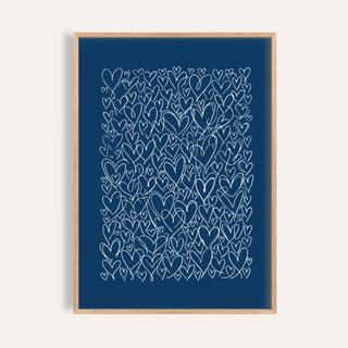 Framed blue artwork with white hearts pattern in a minimalist line-art style