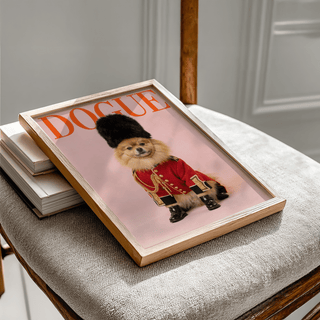 Pomeranian Poster Print of a dog in a royal guard costume with red and black colours framed on a grey cushion