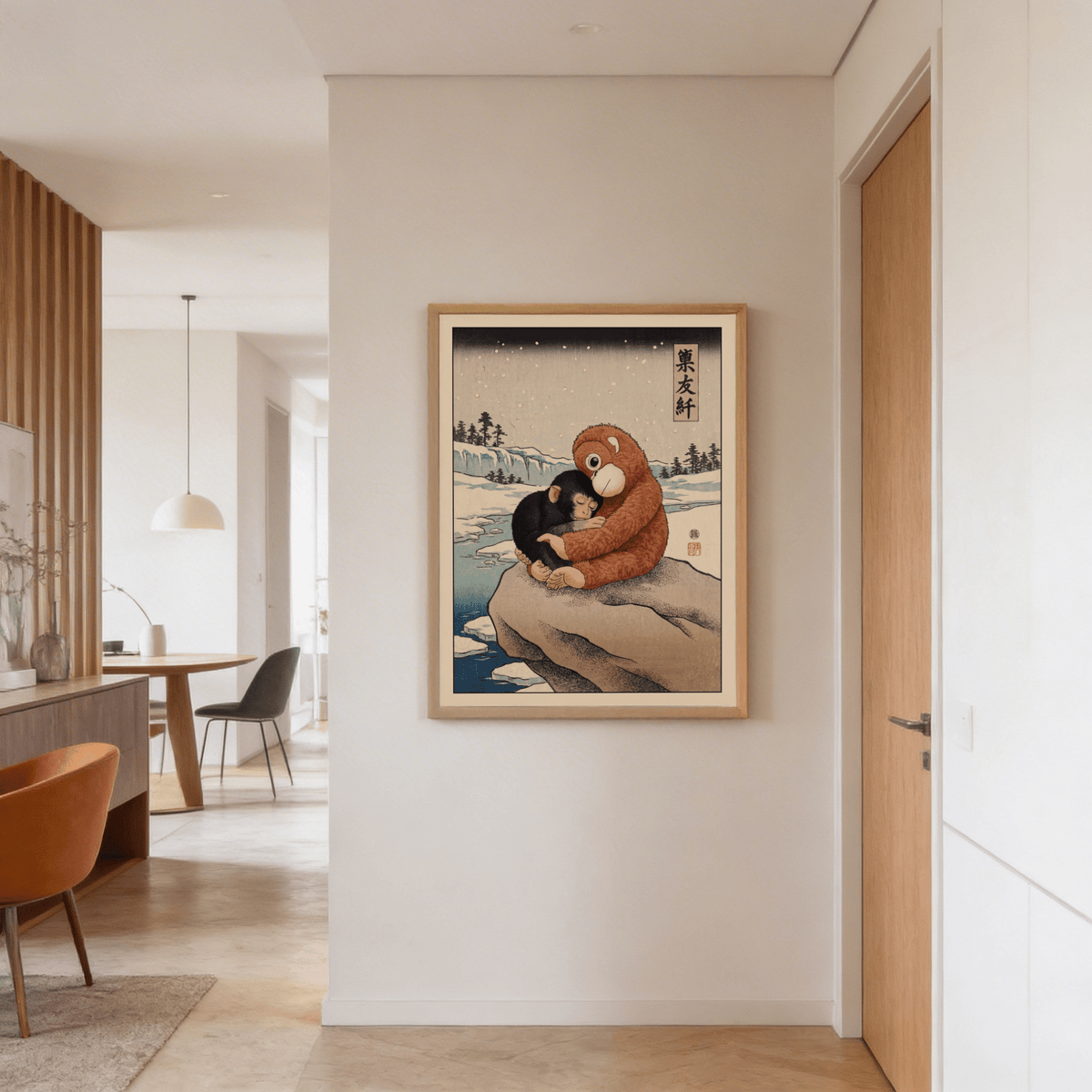 Punch Monkey poster in a light wooden frame on a cream wall in a hallway with a chair