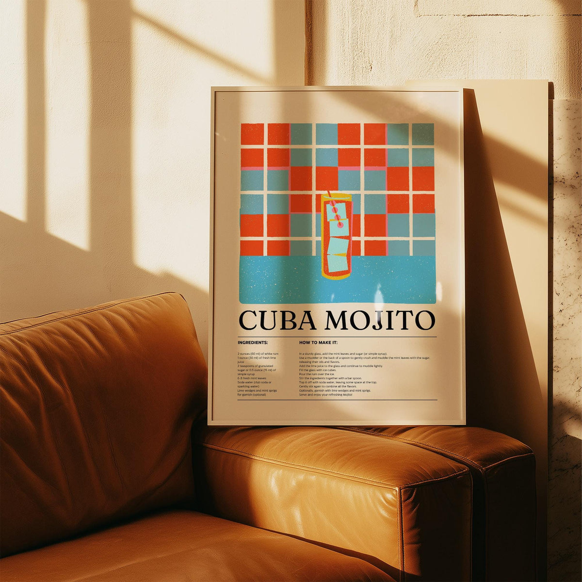 Framed Cuban Mojito Recipe print with bright colourful grid leaning on a tan leather armchair