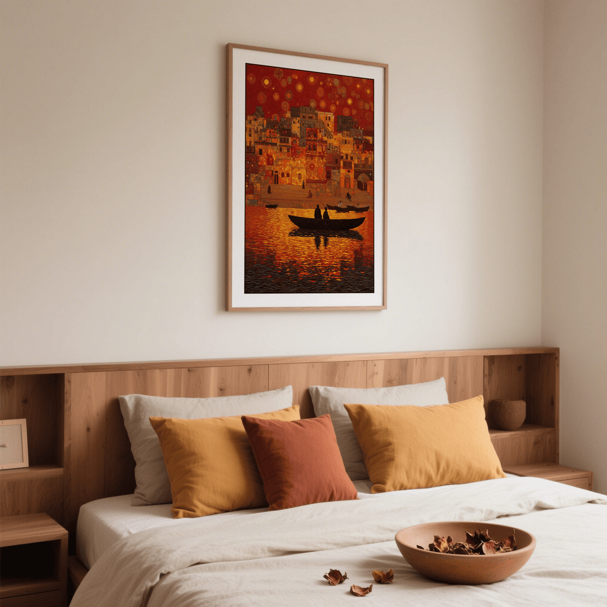Indian Sunset wall art with dusk riverboats and bright orange reflections above a bed with cushions