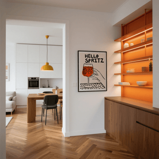 Spritz Print on a wall in a dining room with white walls and wooden floor near orange shelves