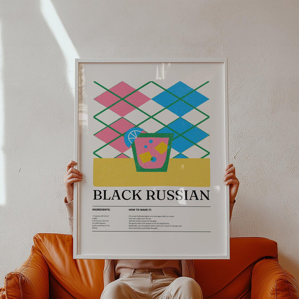 Person holding Home Bar wall art with typographic black russian cocktail in green pink and blue