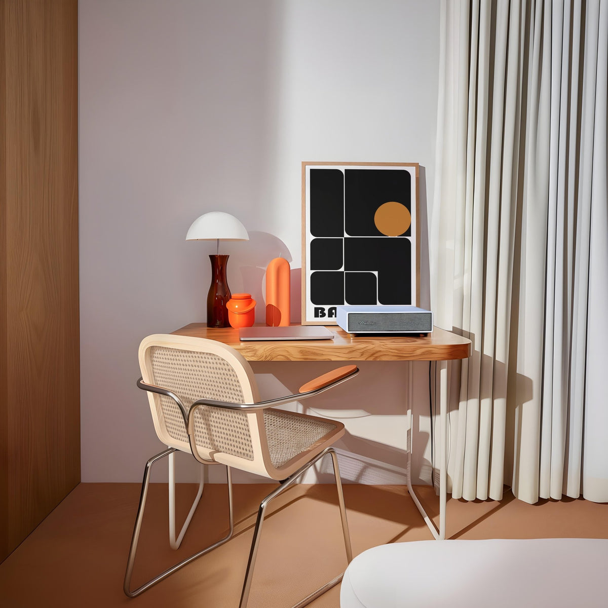 Office Artwork Prints leaning retro precision print with black shapes and a brown circle on a wooden desk with a lamp