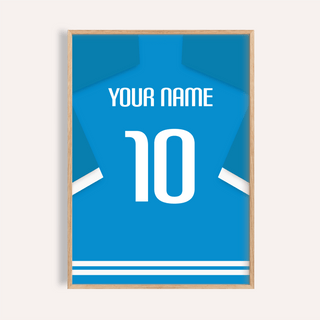 Close-up of a bright blue football shirt poster with white number 10 and text in a wooden frame