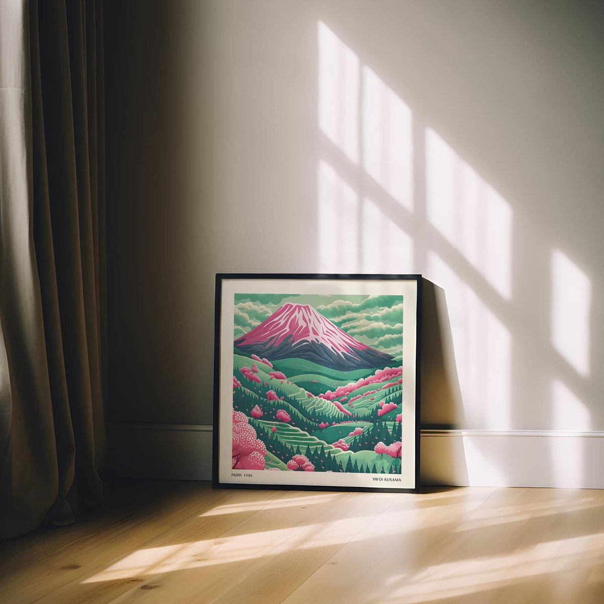Framed Mountain Landscape Art with pink and green hues leaning against a wall with sunlit floor