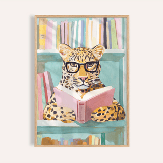 Framed Reading Leopard Art Print of a leopard with glasses reading a pink book