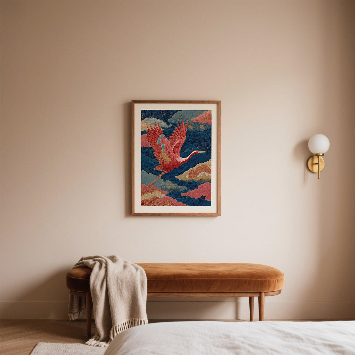 Framed Vintage Japanese Print of a red crane flying with blue and pink clouds hung above a velvet bench