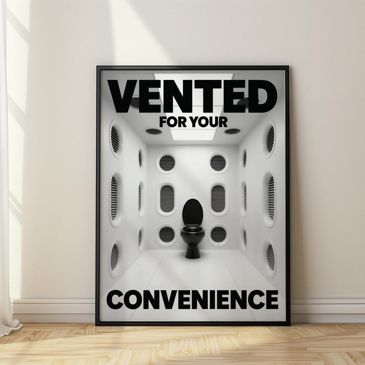 Framed Funny Toilet Sign with a black toilet and vented white room leaning on a floor