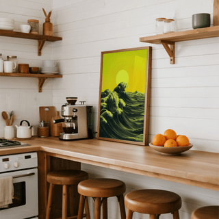 Abstract Ocean Art Print leaning on kitchen counter with green waves and yellow sun beside a bowl of oranges
