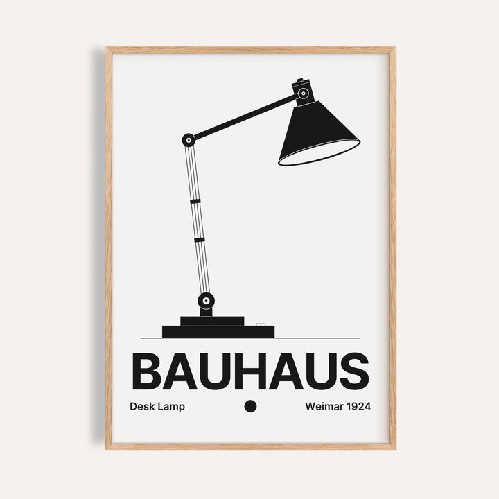 Lamp poster of a jointed desk lamp with a black cone shade and BAUHAUS wordmark