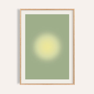 Butter yellow wall art with a glowing yellow orb on soft sage green