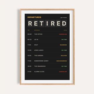 Departures board retirement print shown on a plain warm cream wall