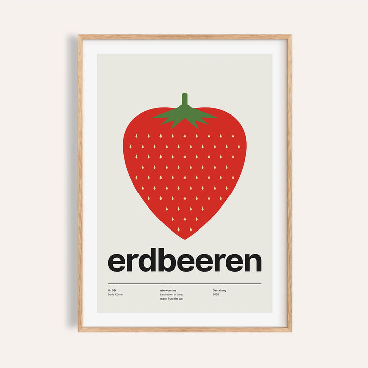 Single big strawberry print shown on a plain warm wall