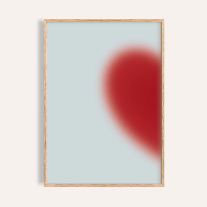 Cherry heart left half print with a soft glowing red heart on pale icy blue