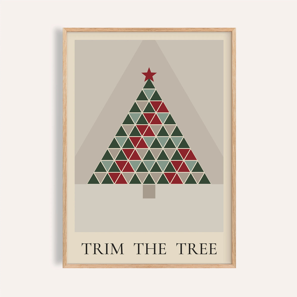 Patchwork quilt Christmas tree print shown on a plain warm wall