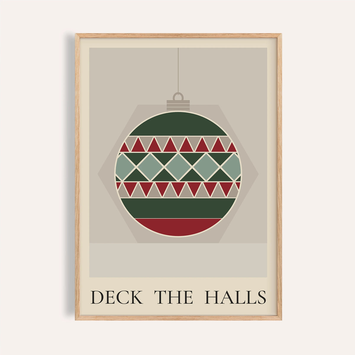 Patchwork Christmas bauble print shown on a plain warm wall