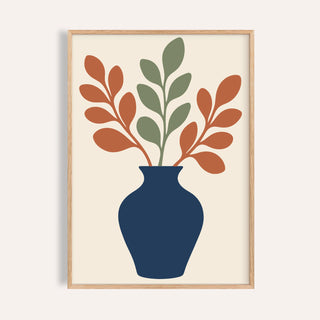 Blue vase print with leafy stems shown on a plain warm wall