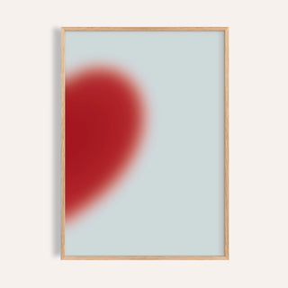 Cherry heart right half print with a soft glowing red heart on pale icy blue