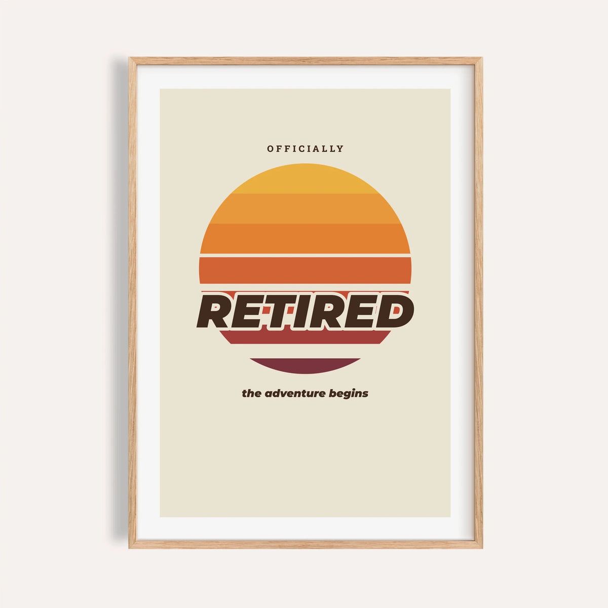 Retro sunset retired print shown on a plain warm cream wall