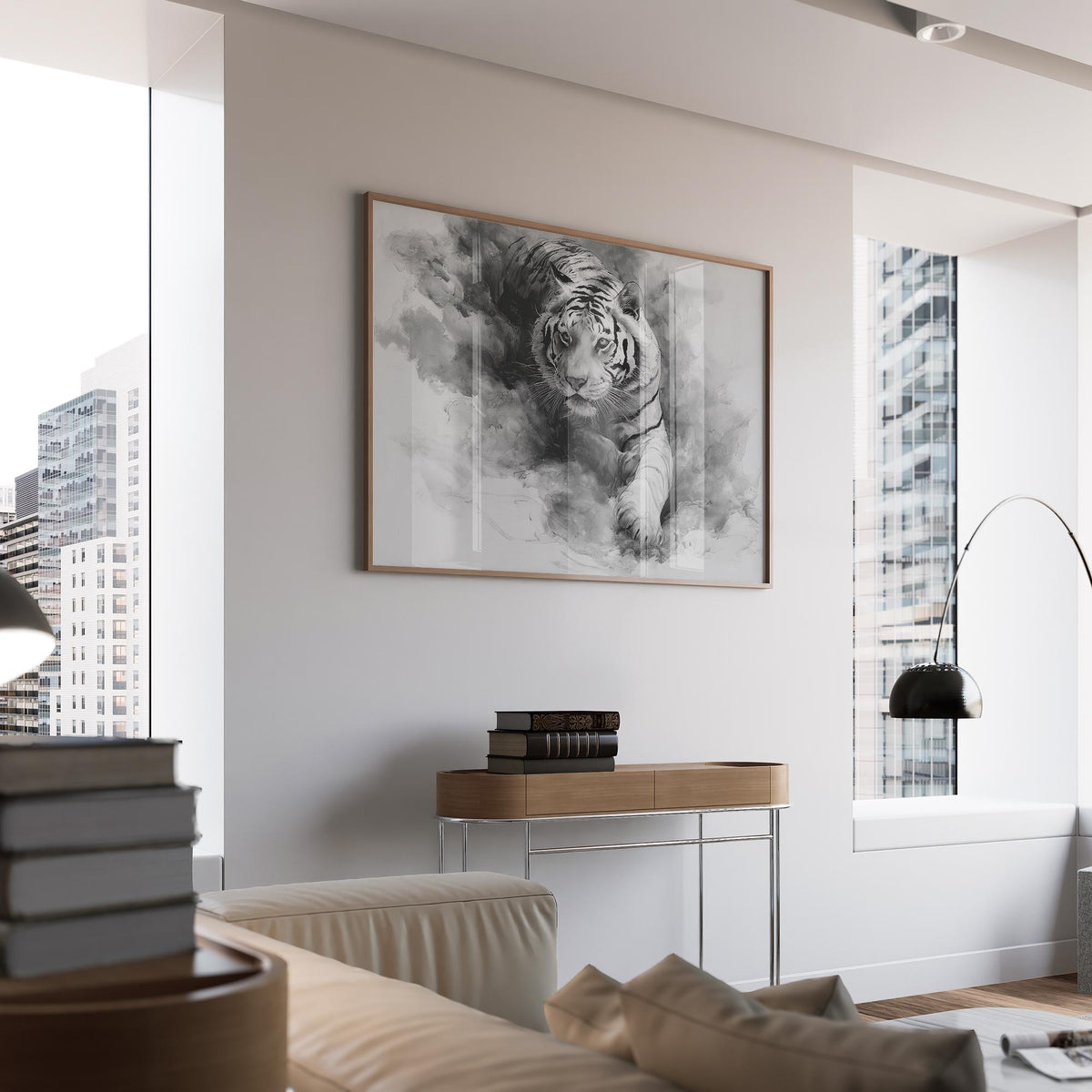 Landscape Tiger Print framed on a living room wall above a small console table with stacked books
