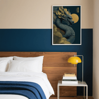 Print on a wall in a bedroom of a mythical dragon head with gold and dark blue tones above a bedside table