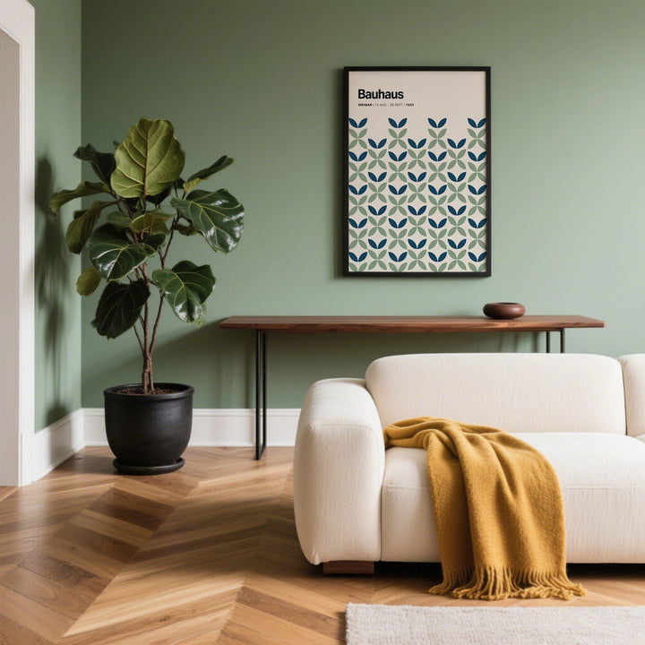 Blue and Green Wall Art framed print with geometric leaf pattern above a slim wooden console table